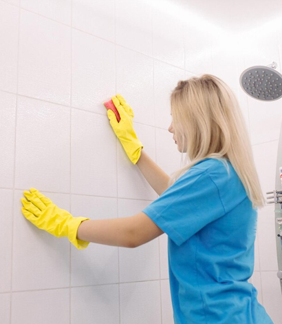 Cleaning bathroom areas used by the client
